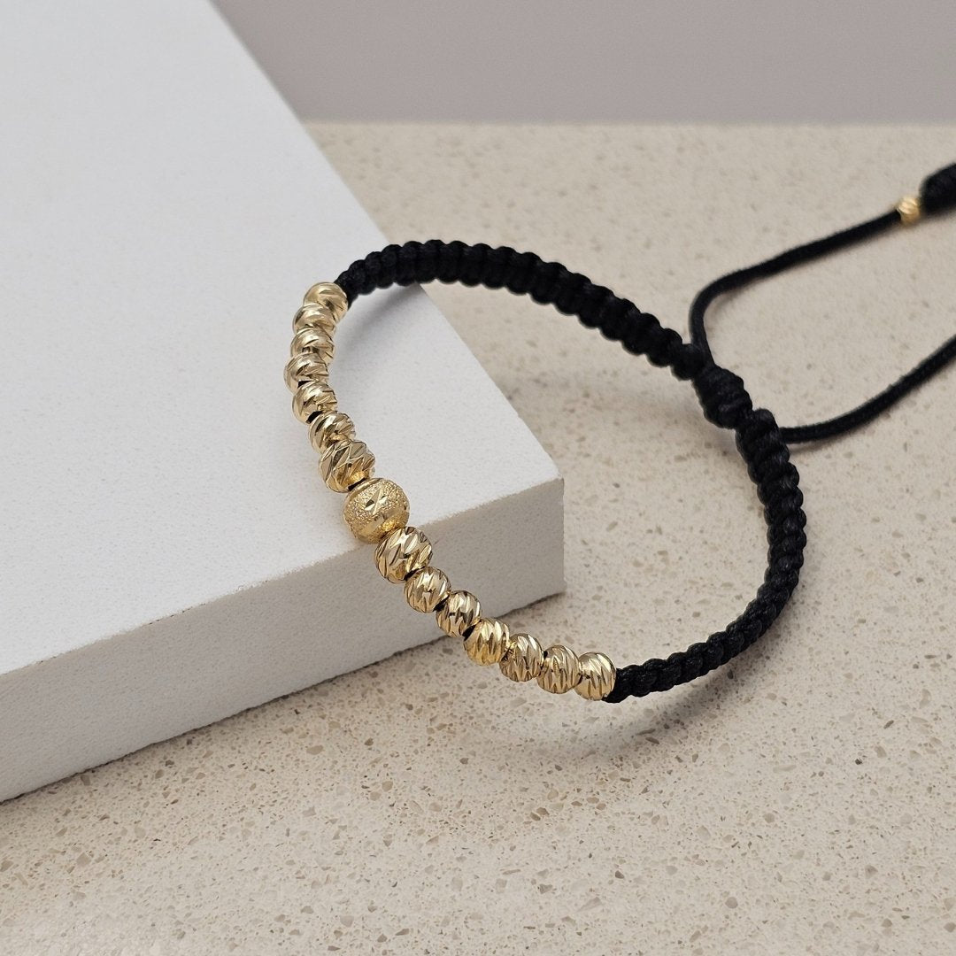 Pulsera Macramé Estrella en oro laminado