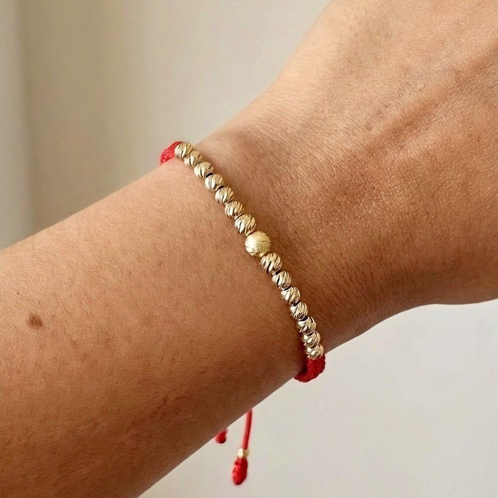 Pulsera Macramé Estrella en oro laminado