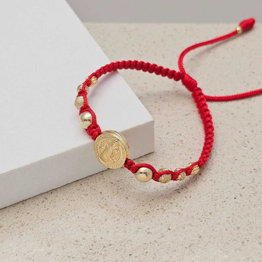 Pulsera San Benito Abrazado en oro laminado